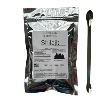 Shilajit powder in a silver bag with measuring spoon