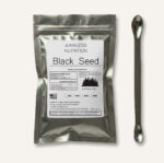 Black seed powder with spoon